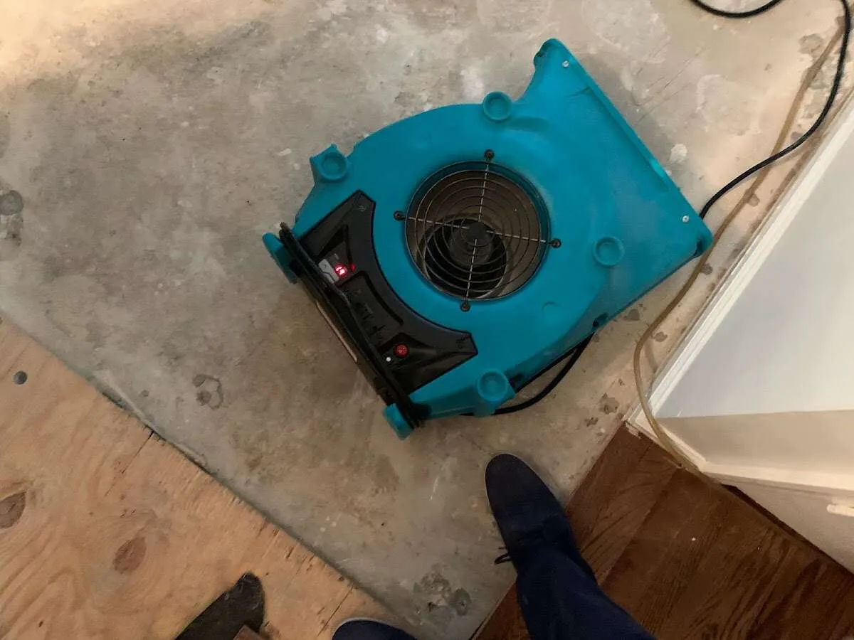 Air mover drying subfloor during Leak Detection & Repair in North Lauderdale